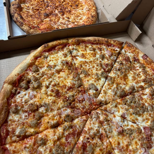 18" XX-Large Specialty Pizza Plus 12" Cheese Pizza.